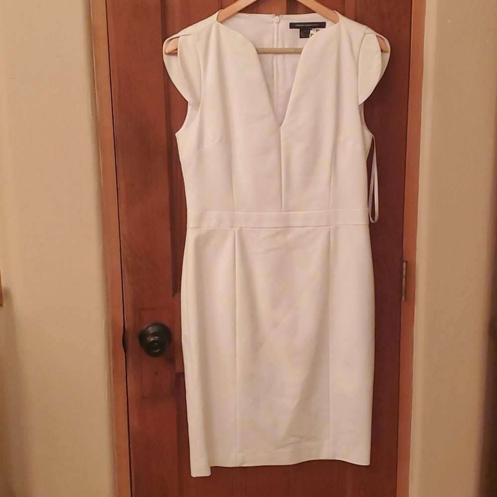 Beautiful white deep V cap sleeve dress